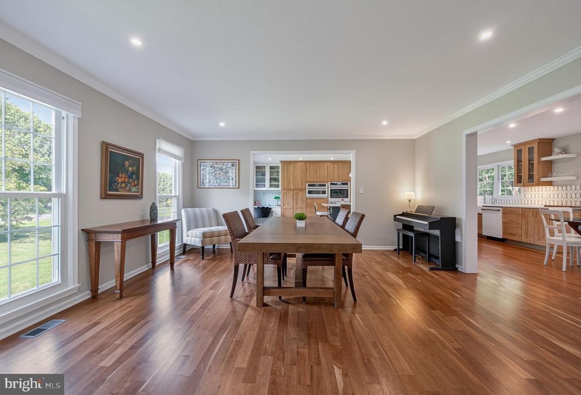 Dining room, Interior, Kitchen, Piano, Recessed Lighting, Stainless Steel Appliances, Wood Texture Flooring