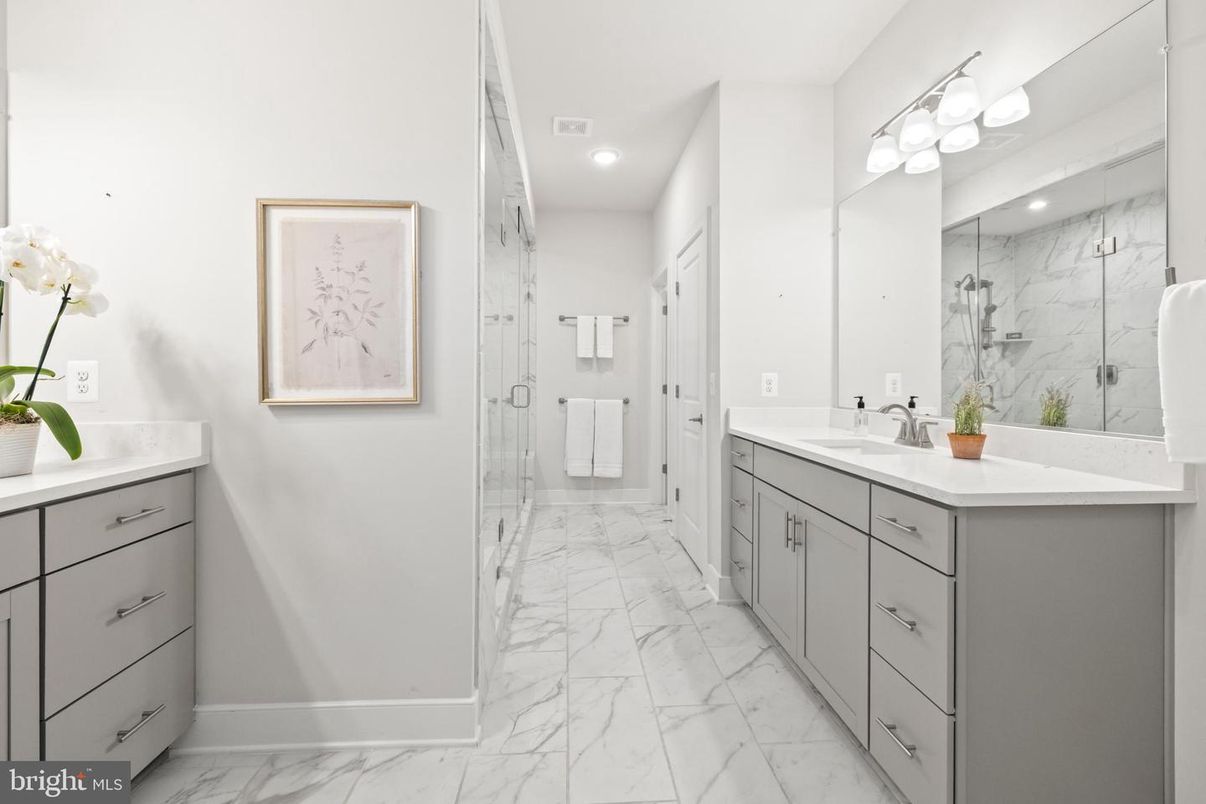 Bathroom, Dual Sink Vanities, Glass Shower, Interior, Marble, Marble Walls, Recessed Lighting