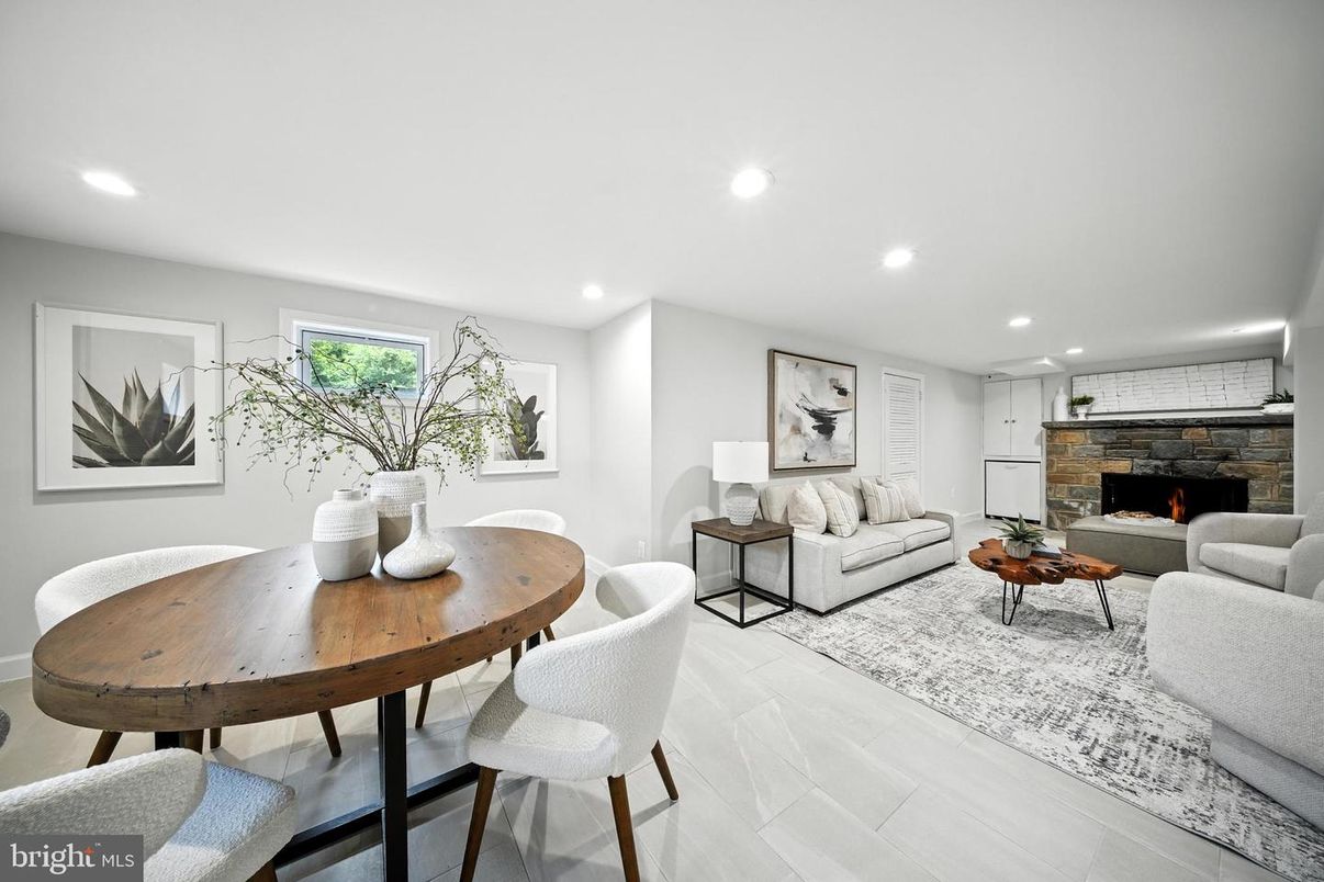 Dining room, Fireplace, Interior, Living room, Recessed Lighting, Wood Texture Flooring