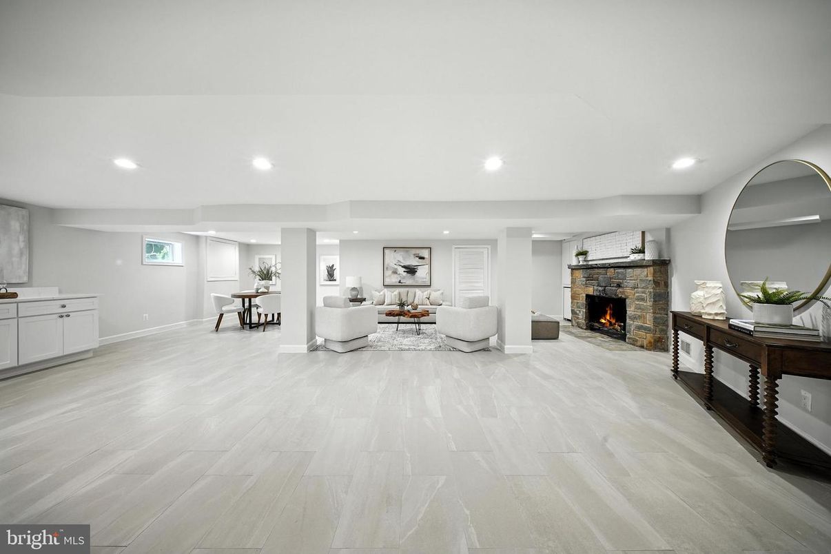 Fireplace, Interior, Living room, Recessed Lighting, Stone Walls, Wood Texture Flooring
