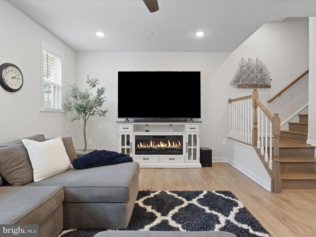 Fireplace, Interior, Living room, Recessed Lighting, Wood Texture Flooring