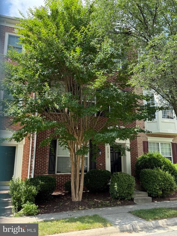 Exterior, Facade, Brick Facade, Condo Building