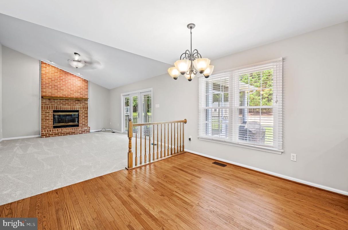 Chandelier, Empty room, Fireplace, Interior, Stone Walls, Wood Texture Flooring