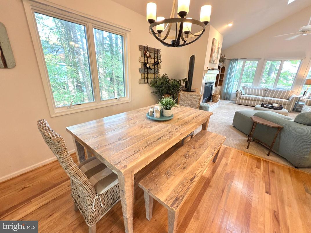 Chandelier, Dining room, Fireplace, Interior, Living room, Recessed Lighting, Wood Texture Flooring