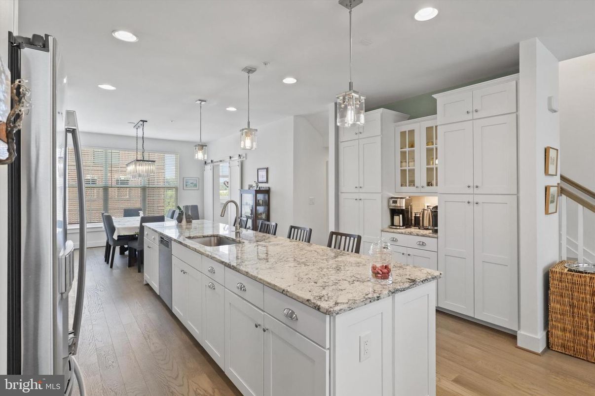 Dining room, Interior, Kitchen, Pendant Lights, Recessed Lighting, Stainless Steel Appliances, Wood Texture Flooring