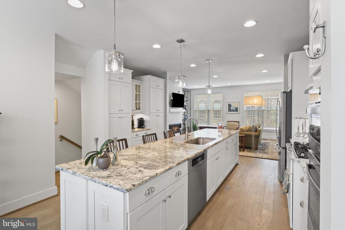Fireplace, Interior, Kitchen, Living room, Pendant Lights, Recessed Lighting, Stainless Steel Appliances, Wood Texture Flooring