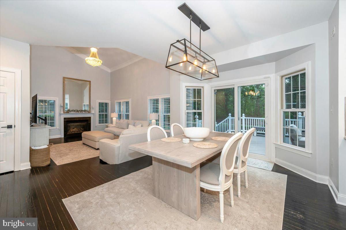 Dining room, Fireplace, Interior, Living room, Pendant Lights, Wood Texture Flooring