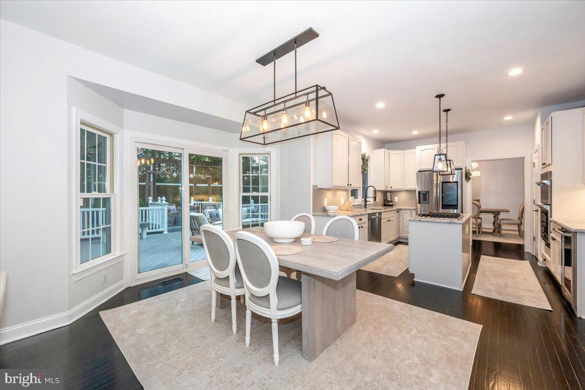 Dining room, Interior, Kitchen, Pendant Lights, Recessed Lighting, Stainless Steel Appliances, Wood Texture Flooring