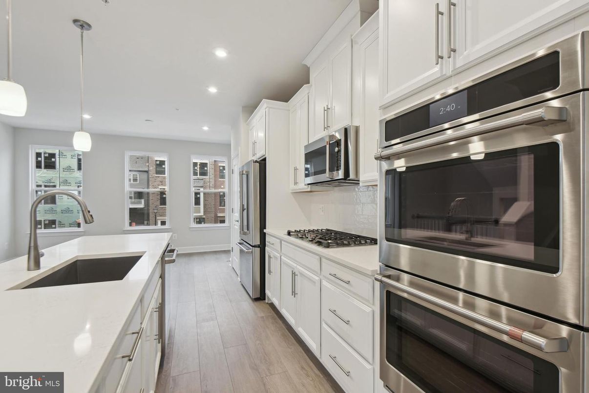 Interior, Kitchen, Pendant Lights, Recessed Lighting, Stainless Steel Appliances, Wood Texture Flooring