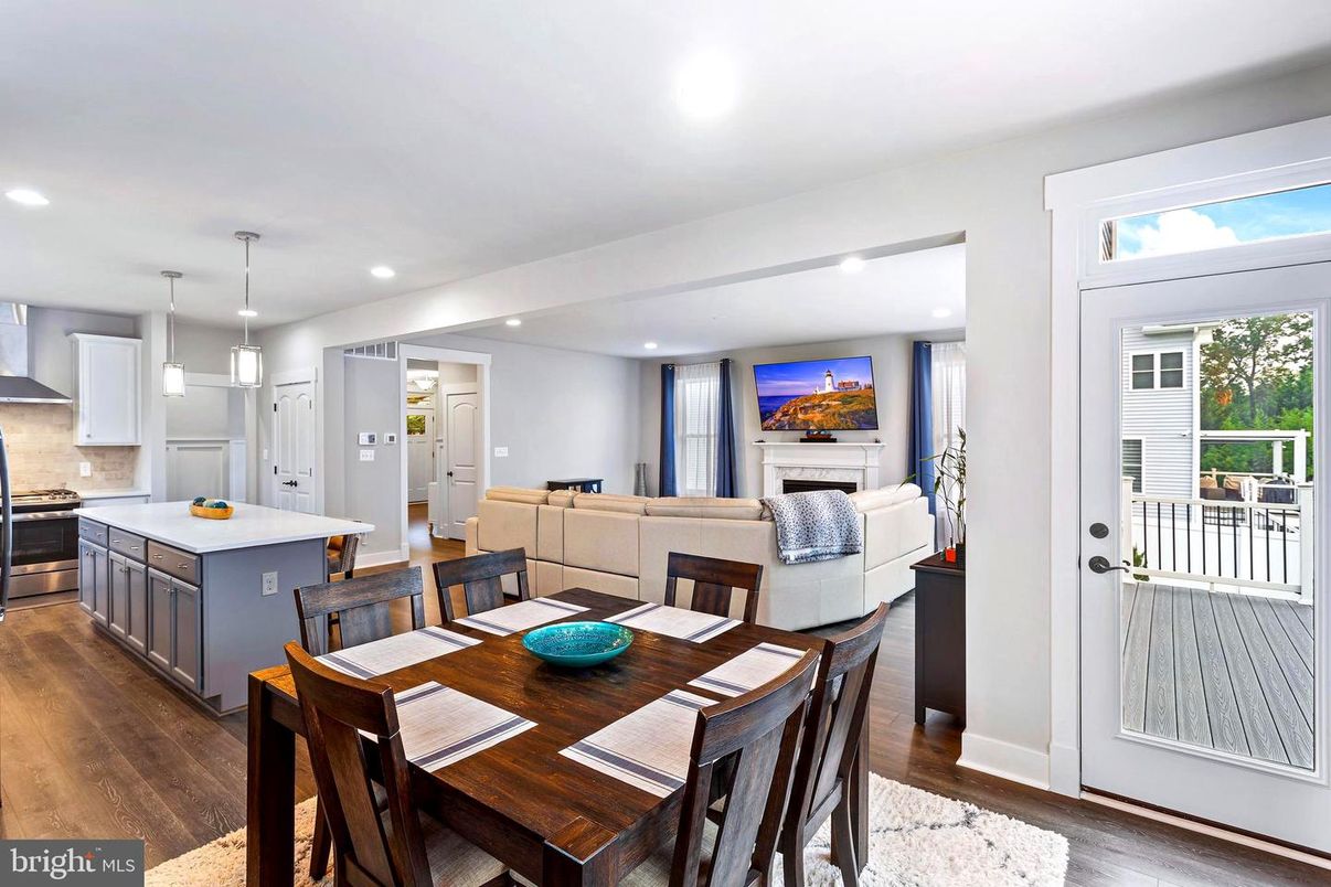 Dining room, Fireplace, Interior, Kitchen, Living room, Pendant Lights, Recessed Lighting, Wood Texture Flooring