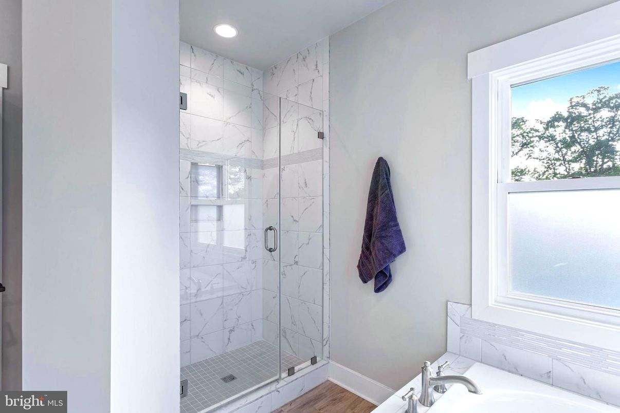 Bathroom, Glass Shower, Interior, Marble Walls, Recessed Lighting, Wood Texture Flooring