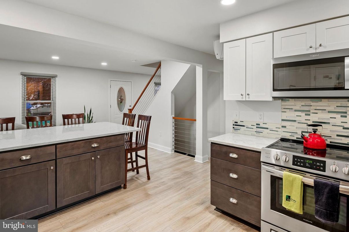 Dining room, Interior, Kitchen, Recessed Lighting, Stainless Steel Appliances, Wood Texture Flooring