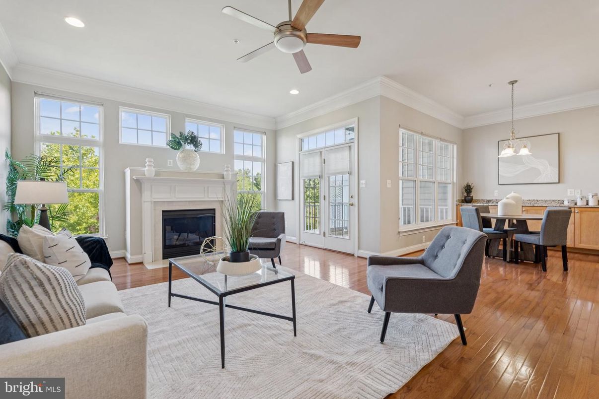 Dining room, Fireplace, Interior, Living room, Pendant Lights, Recessed Lighting, Wood Texture Flooring