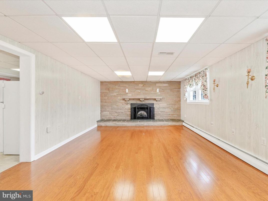 Empty room, Fireplace, Interior, Stone Walls, Wood Texture Flooring