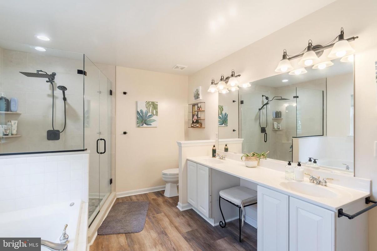 Bathroom, Dual Sink Vanities, Glass Shower, Interior, Recessed Lighting, Wood Texture Flooring