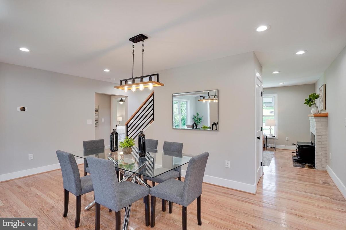 Dining room, Fireplace, Interior, Pendant Lights, Recessed Lighting, Wood Texture Flooring