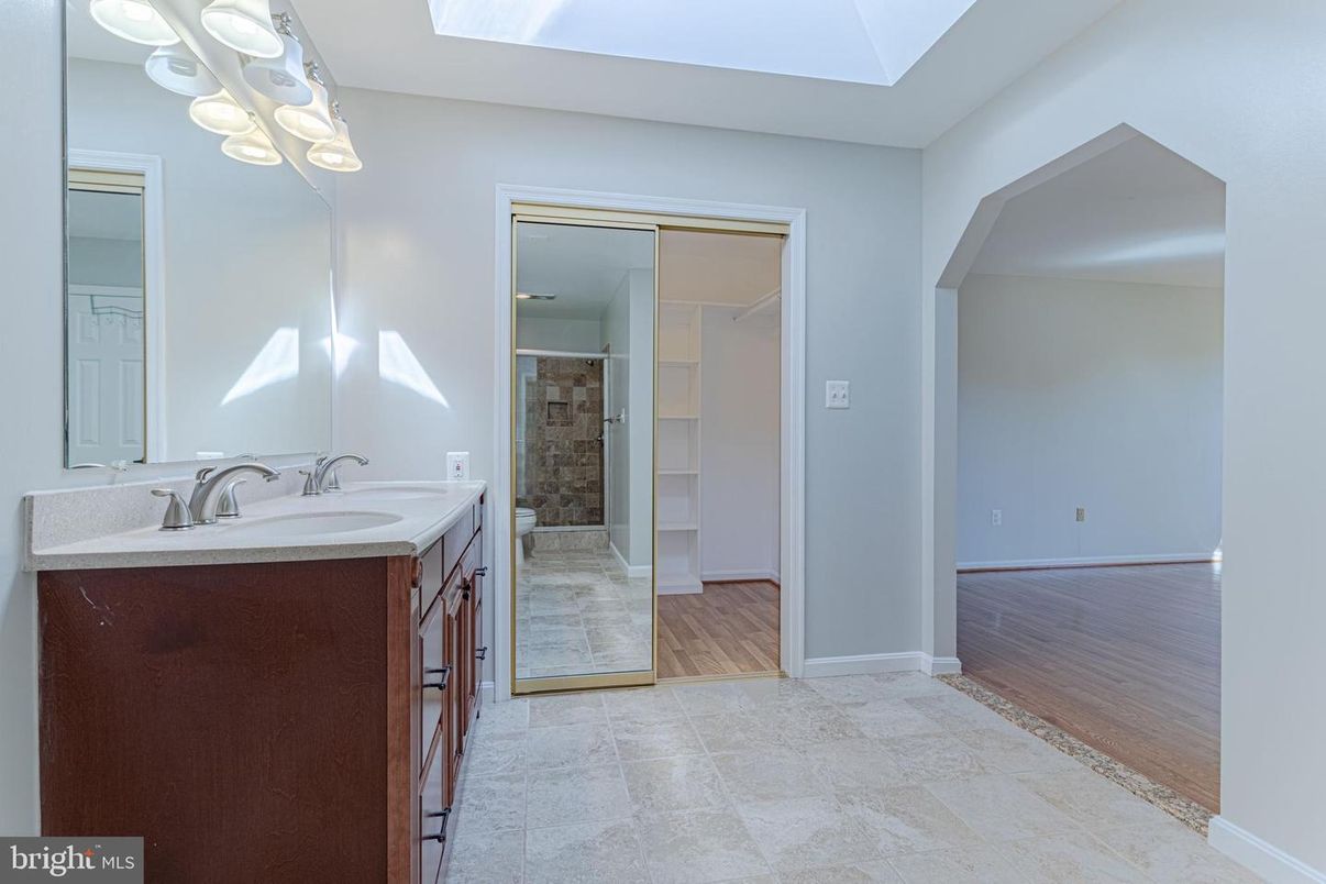Bathroom, Dual Sink Vanities, Glass Shower, Interior, Wood Texture Flooring