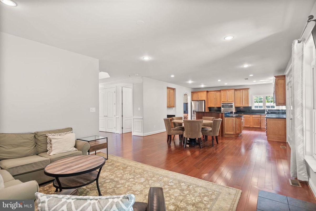 Dining room, Interior, Kitchen, Living room, Recessed Lighting, Stainless Steel Appliances, Wood Texture Flooring