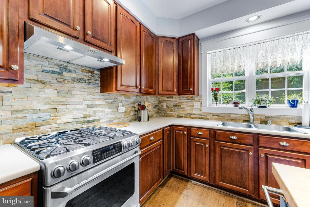 Interior, Kitchen, Recessed Lighting, Stainless Steel Appliances, Stone Walls, Wood Texture Flooring