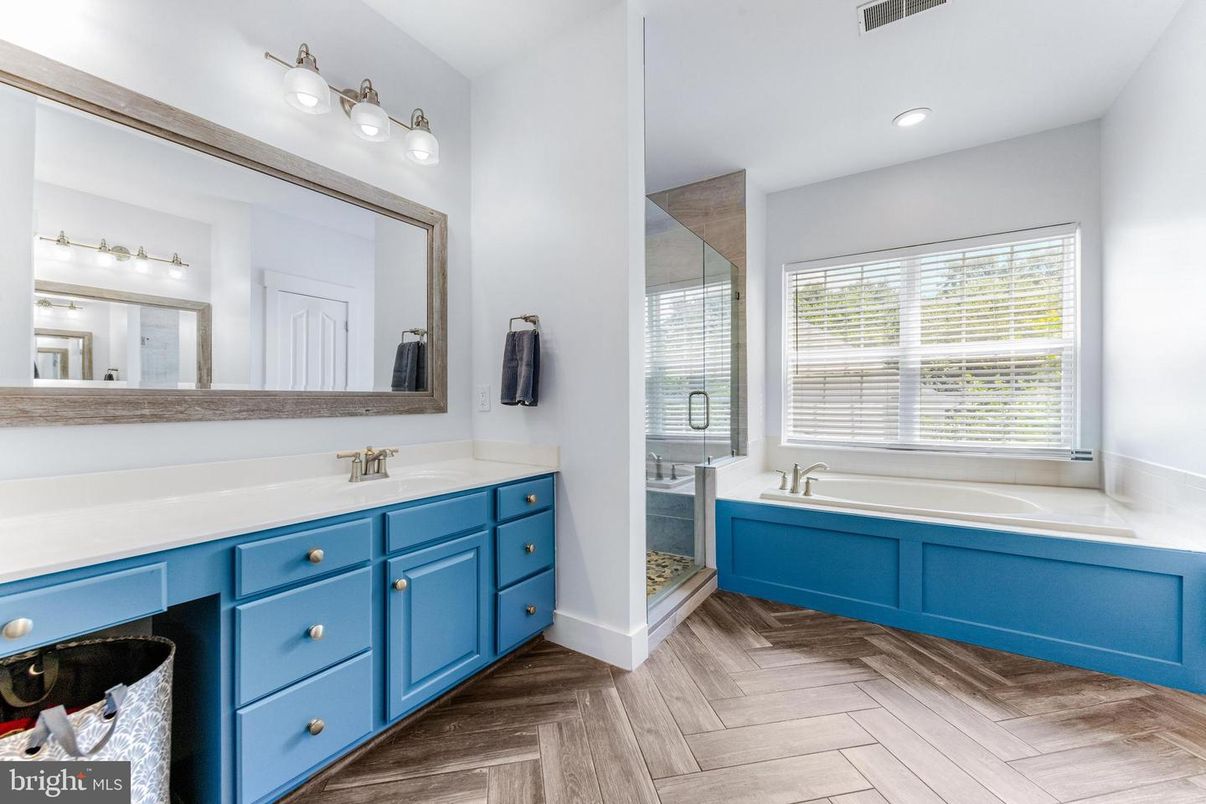 Bathroom, Dual Sink Vanities, Interior, Recessed Lighting, Wood Texture Flooring