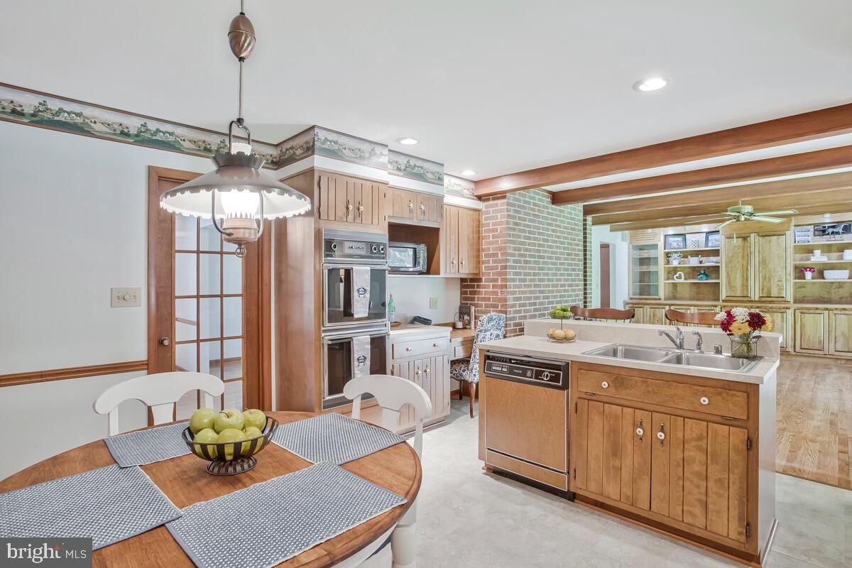 Dining room, Interior, Kitchen, Pendant Lights, Recessed Lighting, Stainless Steel Appliances, Stone Walls