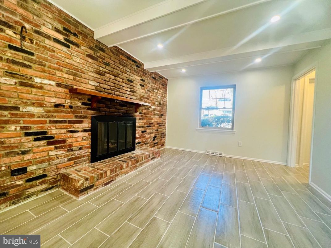 Empty room, Fireplace, Interior, Recessed Lighting, Stone Walls, Wood Texture Flooring, Wooden Walls