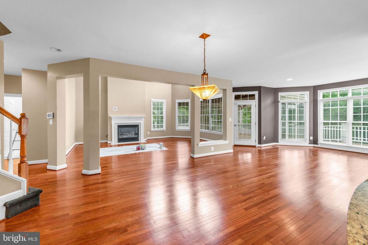 Empty room, Fireplace, Interior, Pendant Lights, Recessed Lighting, Wood Texture Flooring