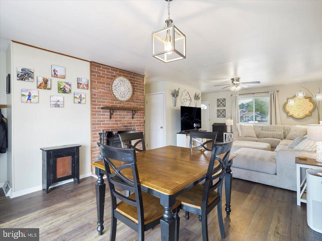 Dining room, Fireplace, Interior, Living room, Pendant Lights, Stone Walls, Wood Texture Flooring