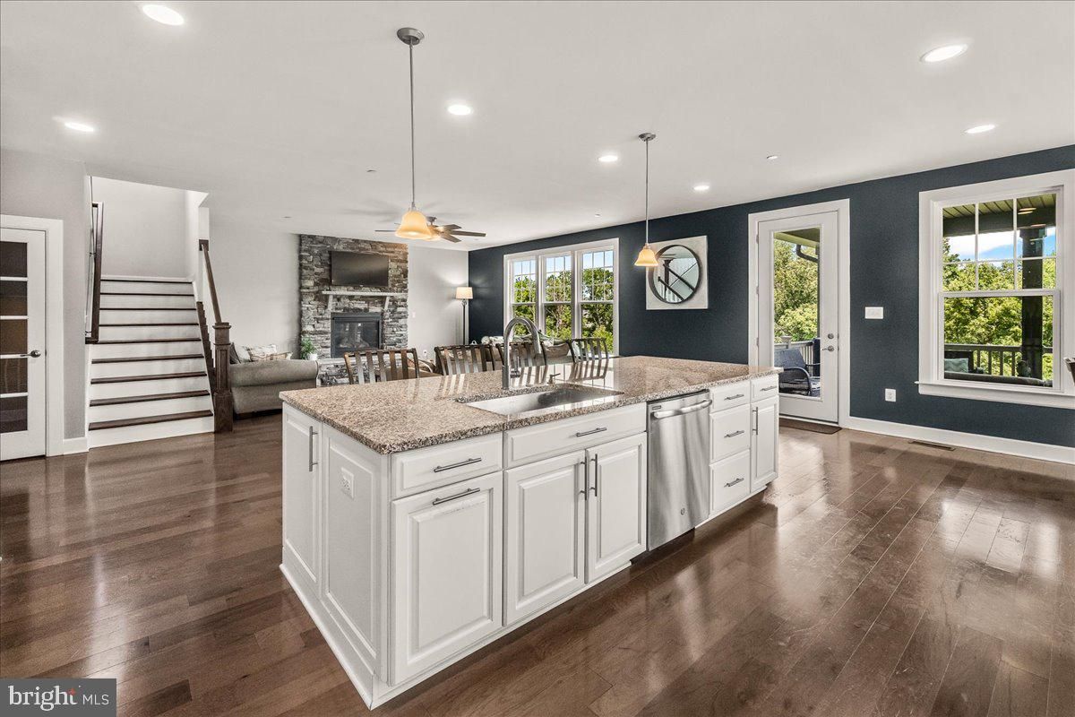 Fireplace, Interior, Kitchen, Pendant Lights, Recessed Lighting, Wood Texture Flooring