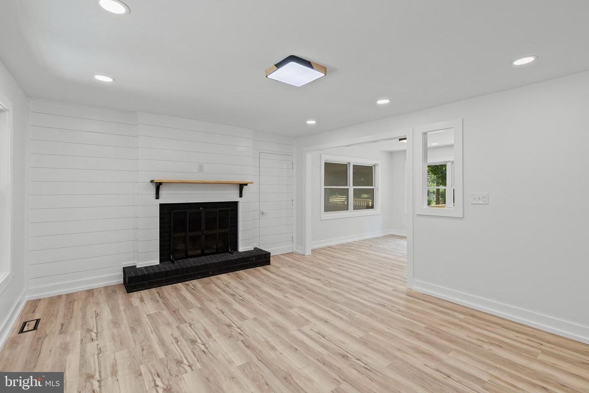 Empty room, Fireplace, Interior, Recessed Lighting, Wood Texture Flooring