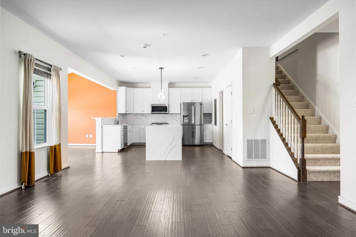 Interior, Kitchen, Marble Walls, Pendant Lights, Recessed Lighting, Stainless Steel Appliances, Wood Texture Flooring