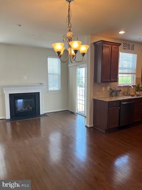 Chandelier, Empty room, Fireplace, Interior, Kitchen, Recessed Lighting, Wood Texture Flooring