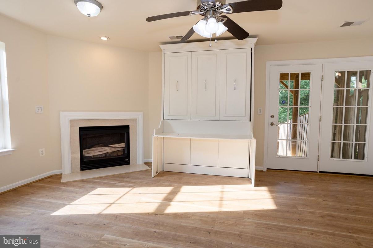 Empty room, Fireplace, Interior, Recessed Lighting, Wood Texture Flooring