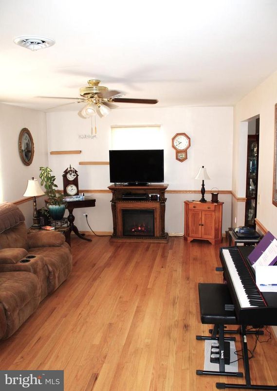 Fireplace, Interior, Living room, Piano, Wood Texture Flooring