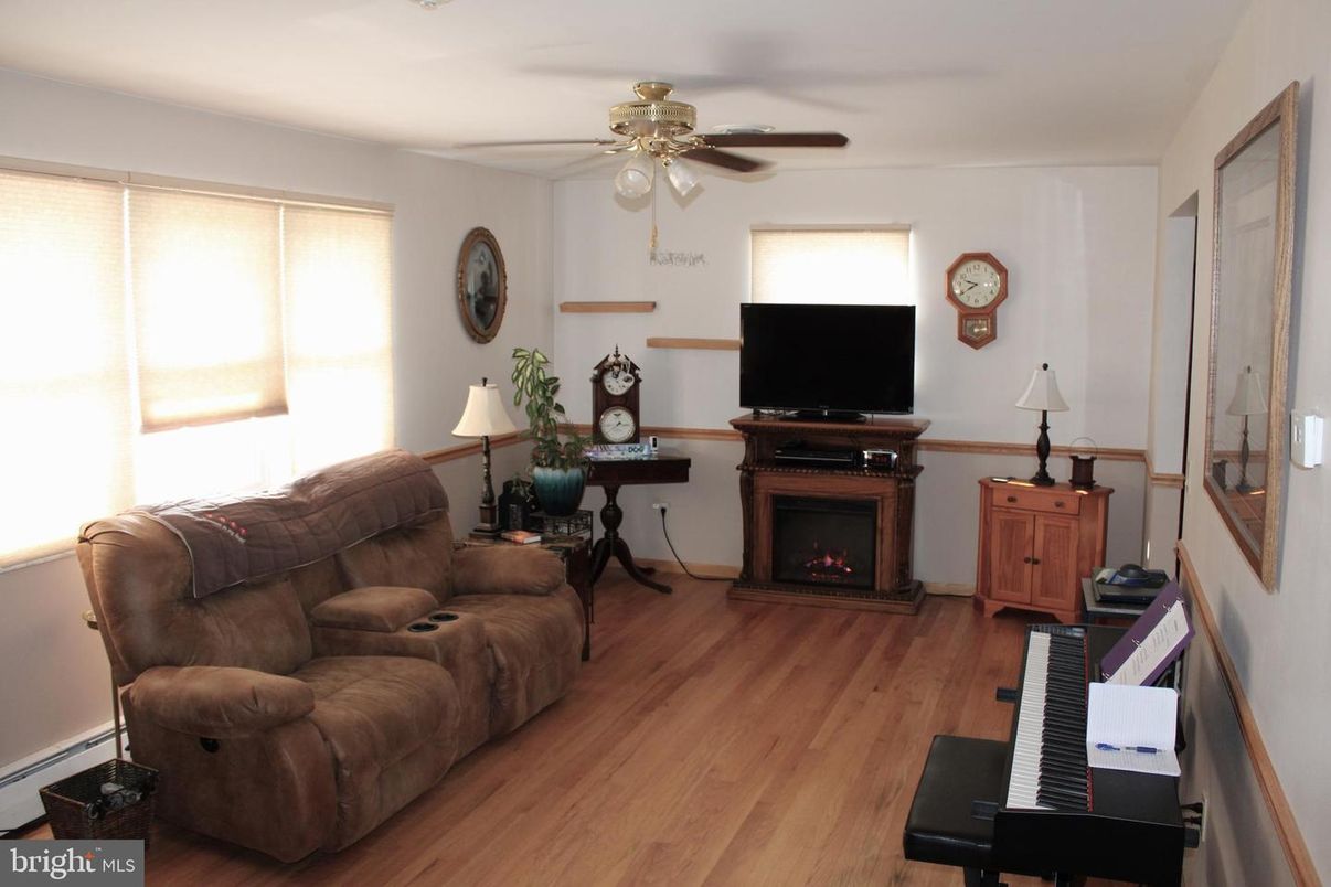 Fireplace, Interior, Living room, Piano, Wood Texture Flooring