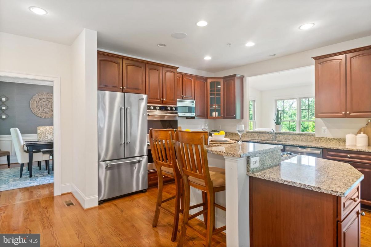 Dining room, Interior, Kitchen, Recessed Lighting, Stainless Steel Appliances, Wood Texture Flooring