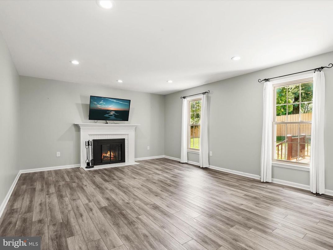 Empty room, Fireplace, Interior, Recessed Lighting, Wood Texture Flooring