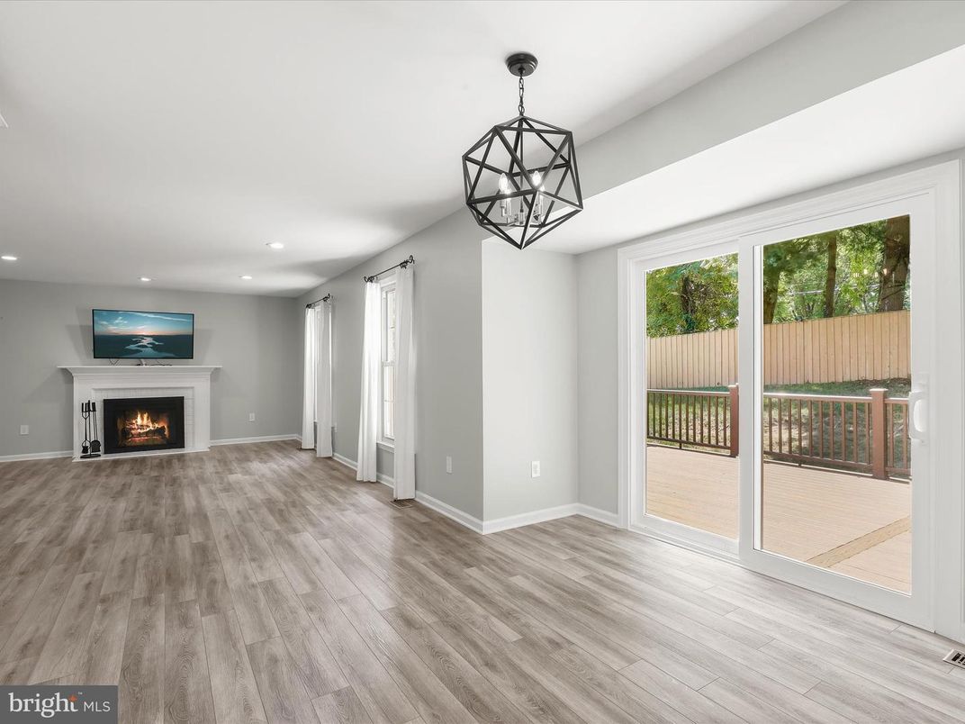Empty room, Fireplace, Interior, Pendant Lights, Recessed Lighting, Wood Texture Flooring