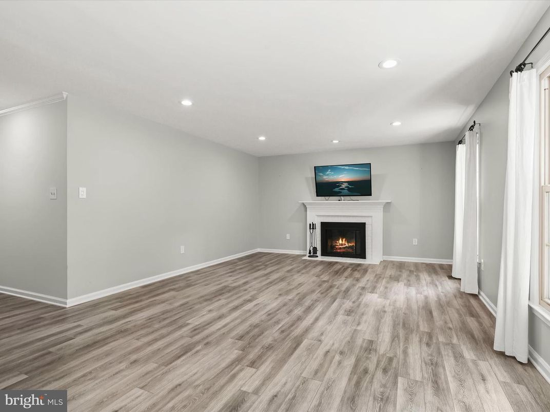 Empty room, Fireplace, Interior, Recessed Lighting, Wood Texture Flooring