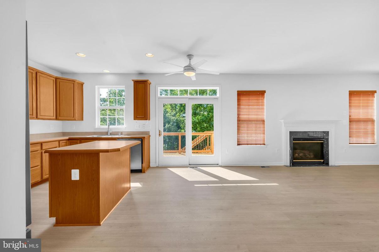 Fireplace, Interior, Kitchen, Recessed Lighting, Wood Texture Flooring