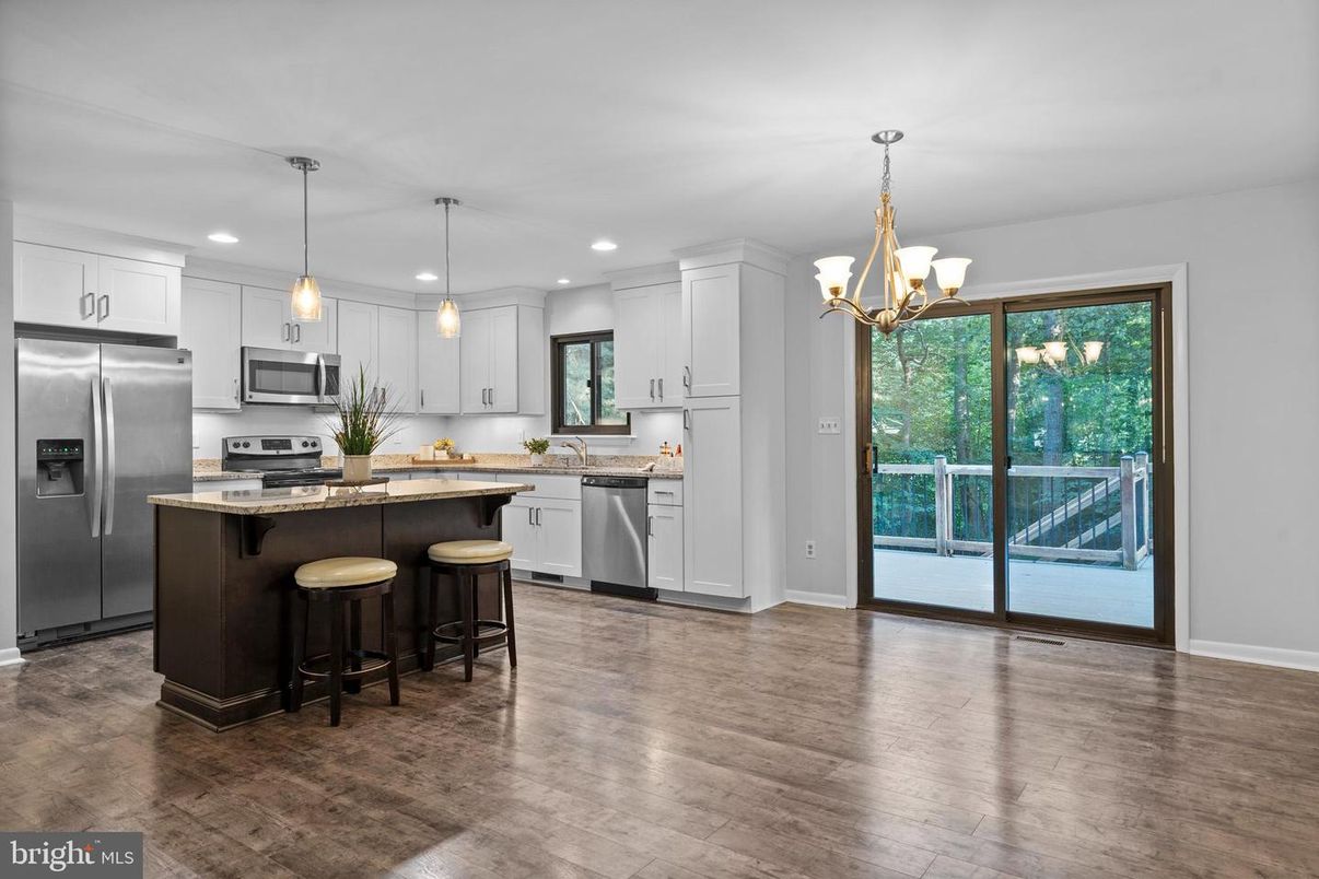 Chandelier, Interior, Kitchen, Pendant Lights, Recessed Lighting, Stainless Steel Appliances, Wood Texture Flooring