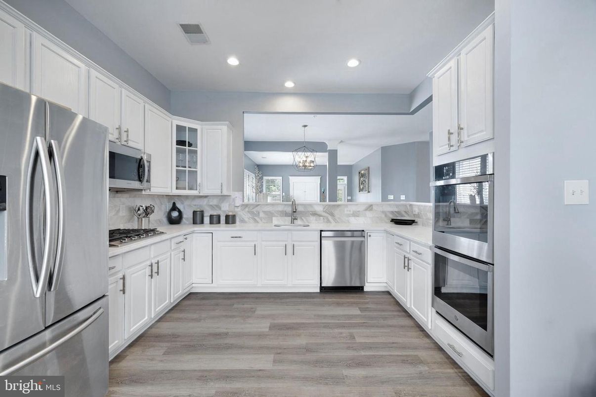 Chandelier, Interior, Kitchen, Recessed Lighting, Stainless Steel Appliances, Wood Texture Flooring