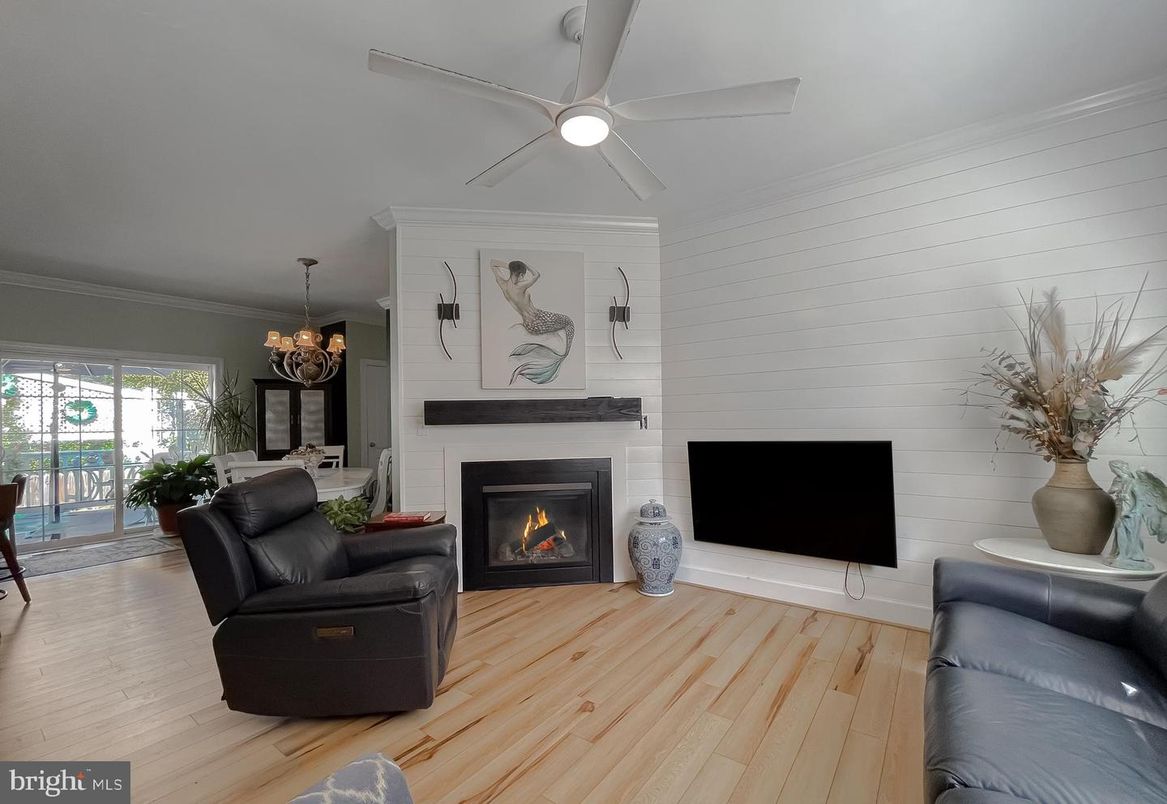 Chandelier, Dining room, Fireplace, Interior, Living room, Wood Texture Flooring