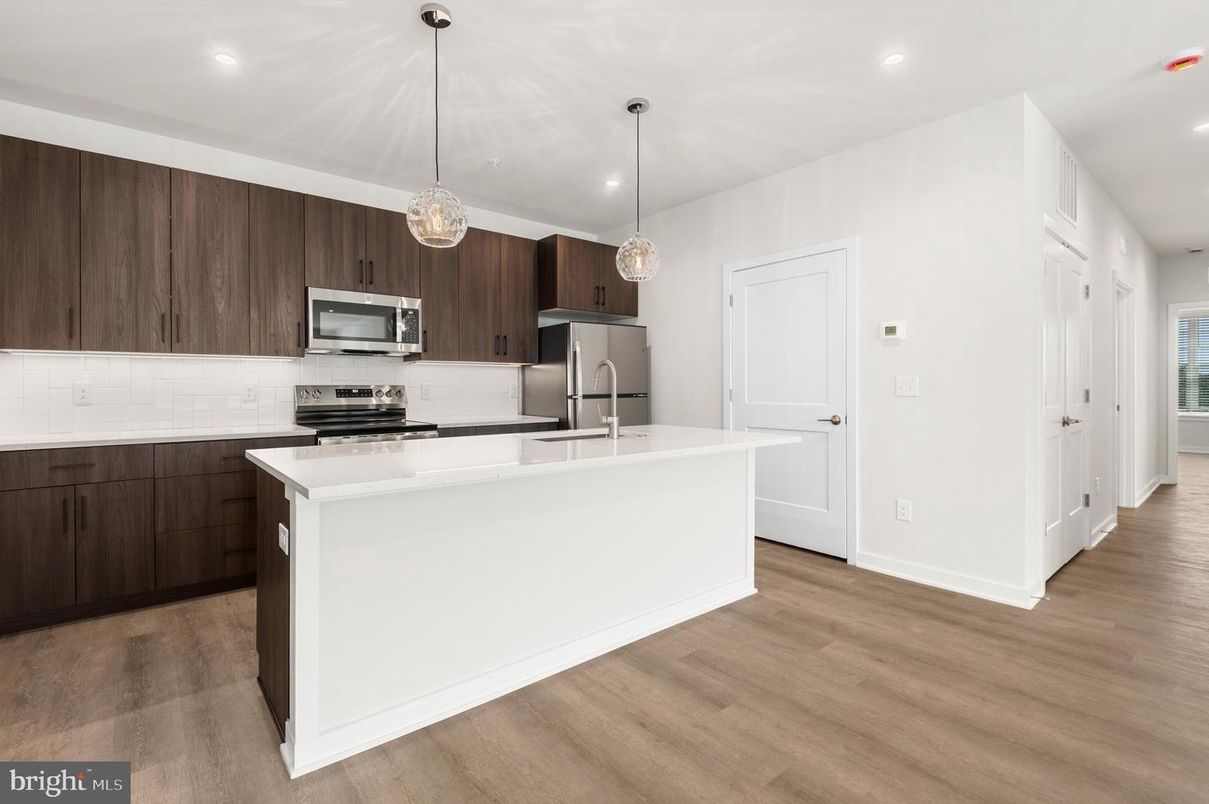 Interior, Kitchen, Pendant Lights, Recessed Lighting, Stainless Steel Appliances, Wood Texture Flooring
