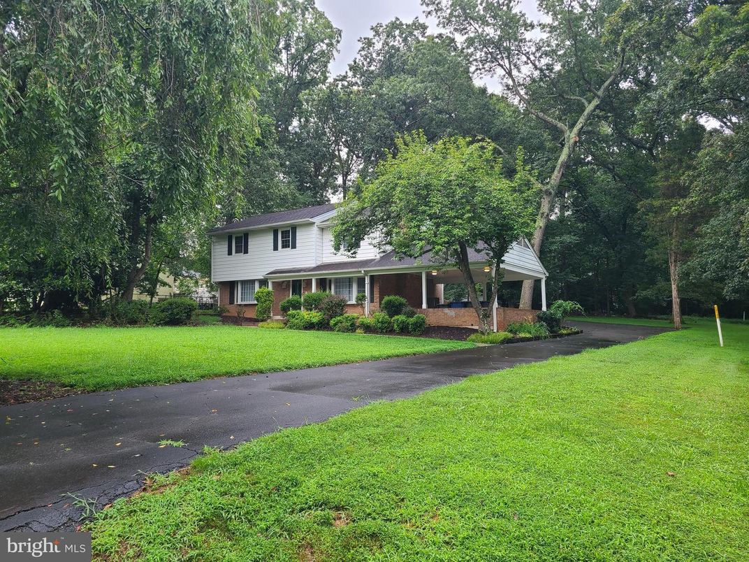 Attached, Backyard, Exterior, Facade, Brick Facade, Split Level