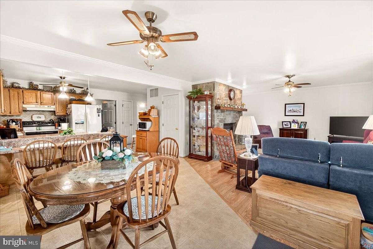 Dining room, Fireplace, Interior, Kitchen, Living room, Pendant Lights, Wood Texture Flooring