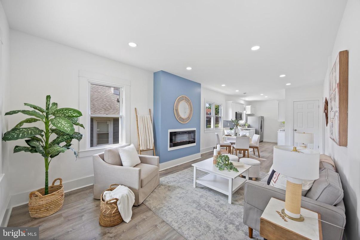 Dining room, Fireplace, Interior, Living room, Recessed Lighting, Wood Texture Flooring