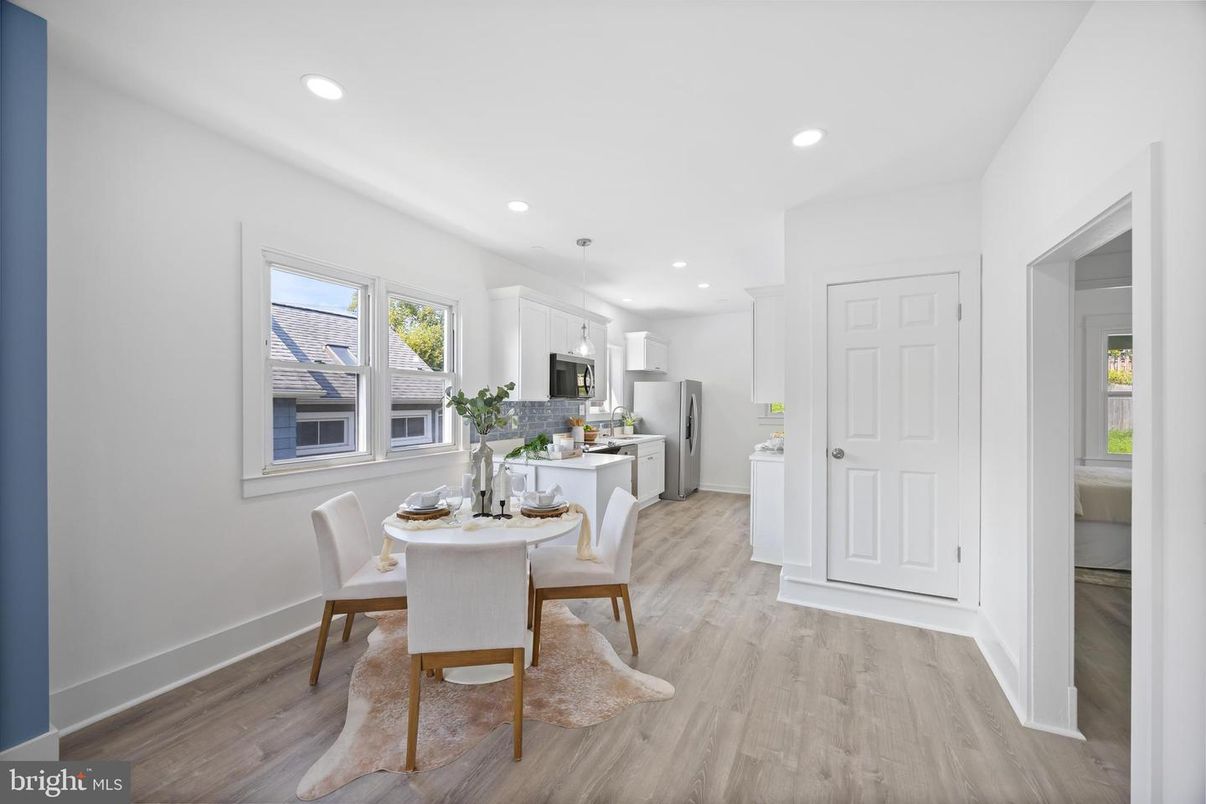 Dining room, Interior, Kitchen, Recessed Lighting, Stainless Steel Appliances, Wood Texture Flooring