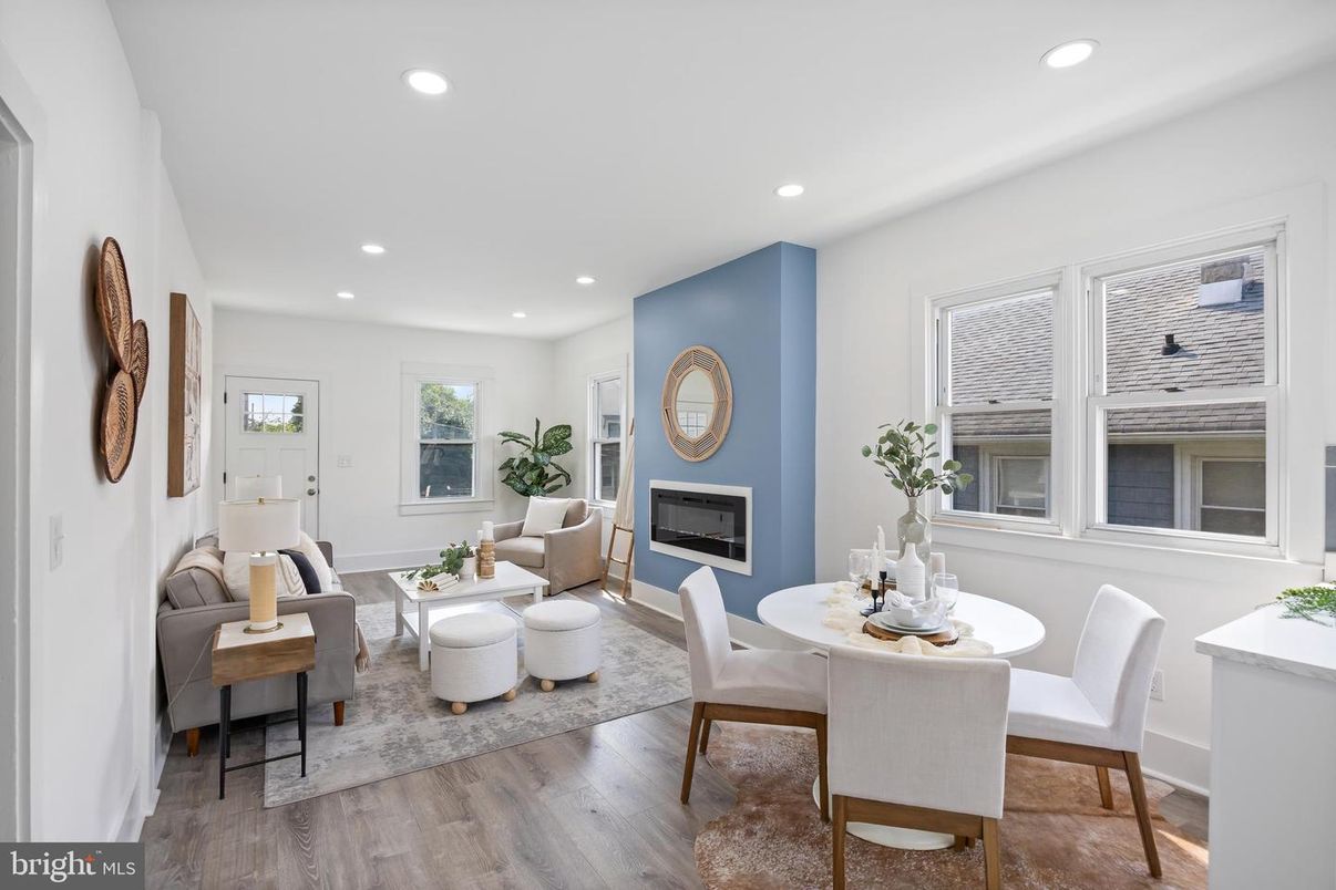 Dining room, Fireplace, Interior, Living room, Recessed Lighting, Wood Texture Flooring