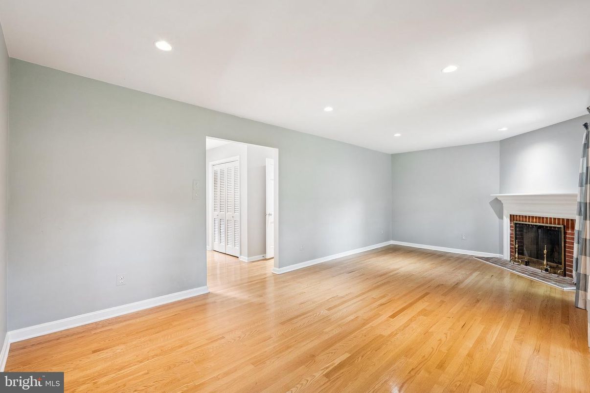 Empty room, Fireplace, Interior, Recessed Lighting, Wood Texture Flooring